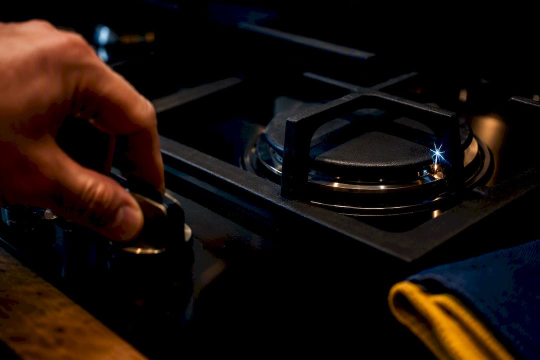 Hand testing an unlit gas burner